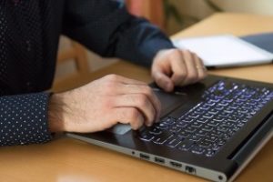 man using laptop 